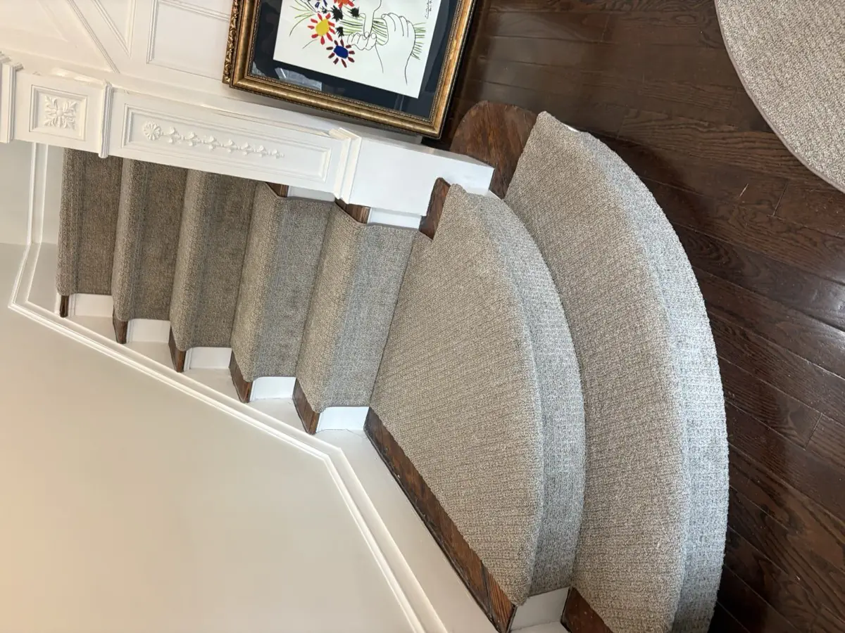 Stair runner wrapped over curved bullnose steps
